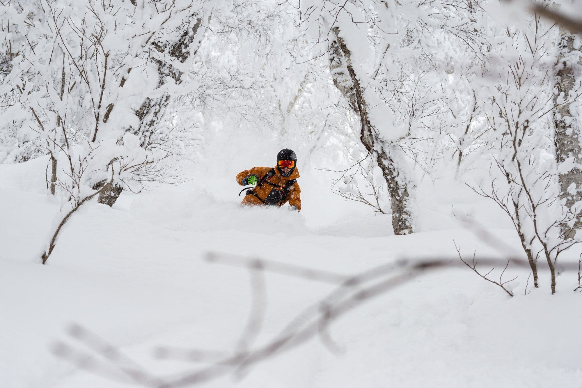 Skier ripping some backcountry lines in Fukushima