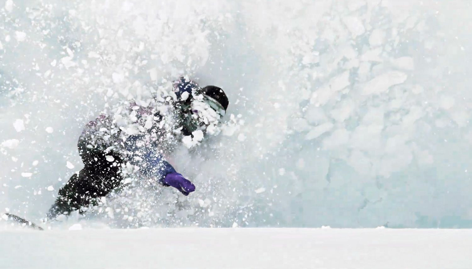 Snowboarder appearing out of the whiteroom at Aizu Kogen