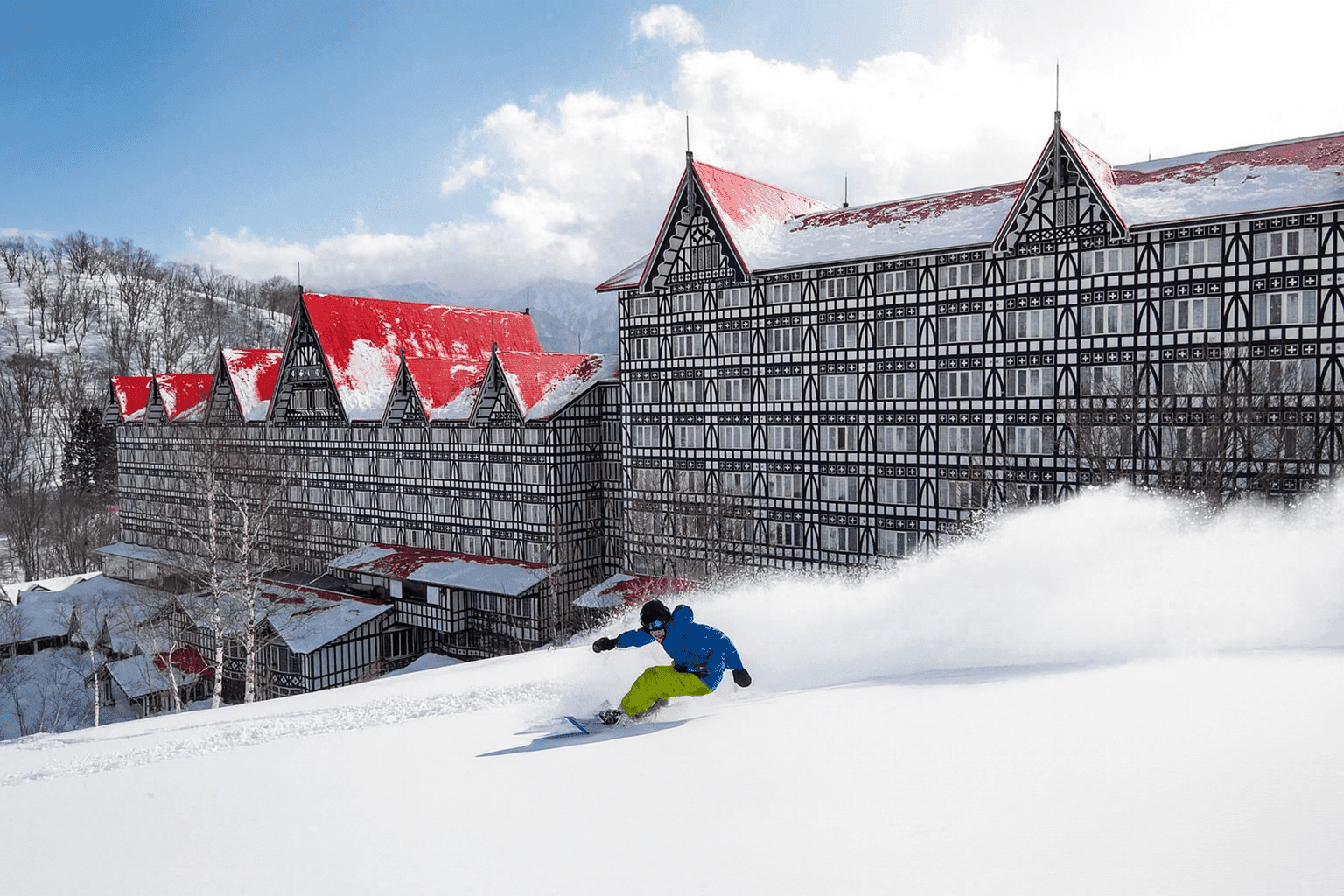 Skier nearby the Hotel Plaza Hotel at Cortina