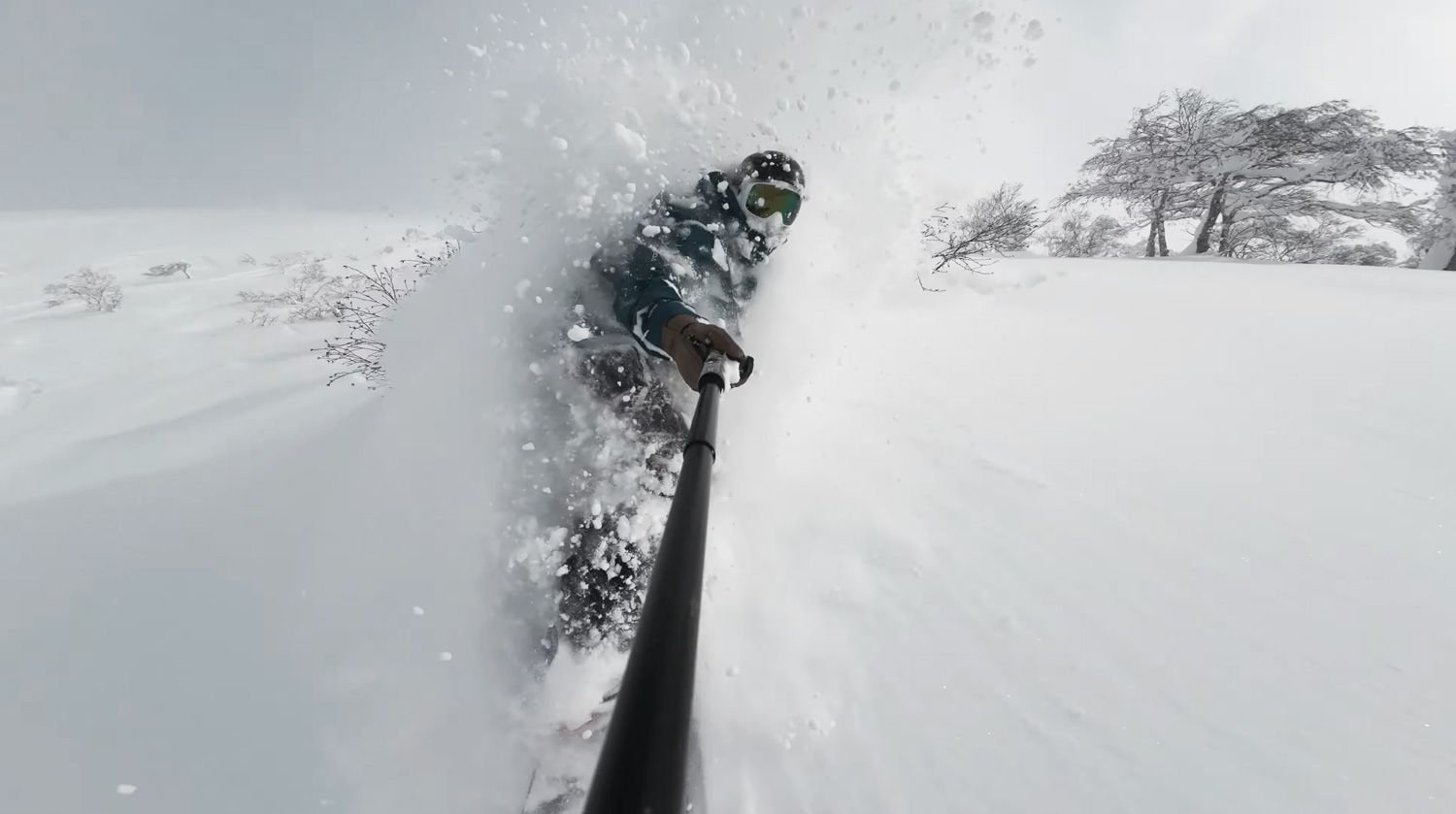 Snowboarder in Hanazono pow