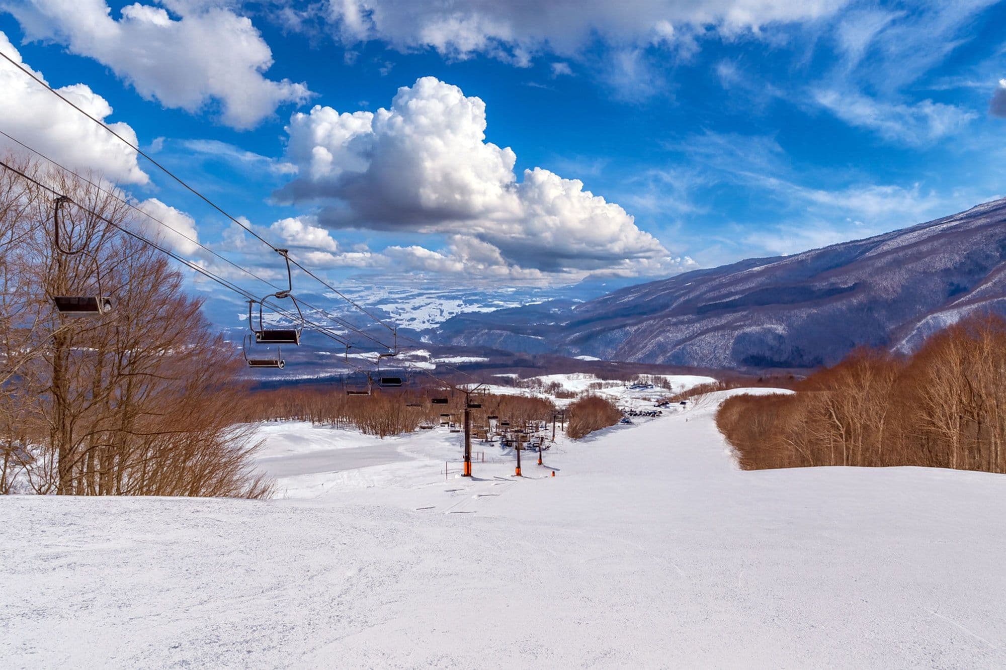 Quiet Iwate lines with onsen steam and storm-day smiles