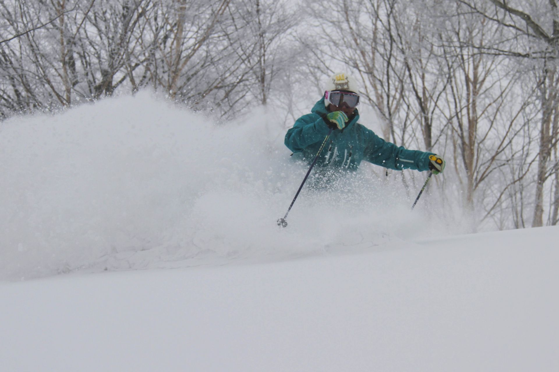 Skier enjoying the japow at Nozawa Onsen