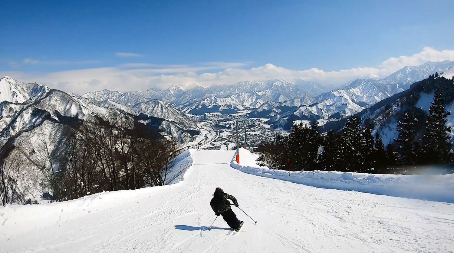 Skier on piste run at Yuzawa Kogen